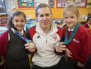 Ian Rose with his Olympic medals