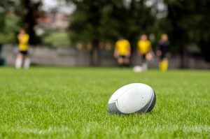 Rugby ball placed on grass