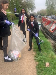 ACS students participating in litter pick-up on the canal 
