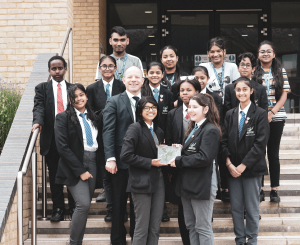 Image of Alperton Students proudly holding the Pearson award