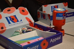Remembrance Day Poppies and wrist bands for sale 
