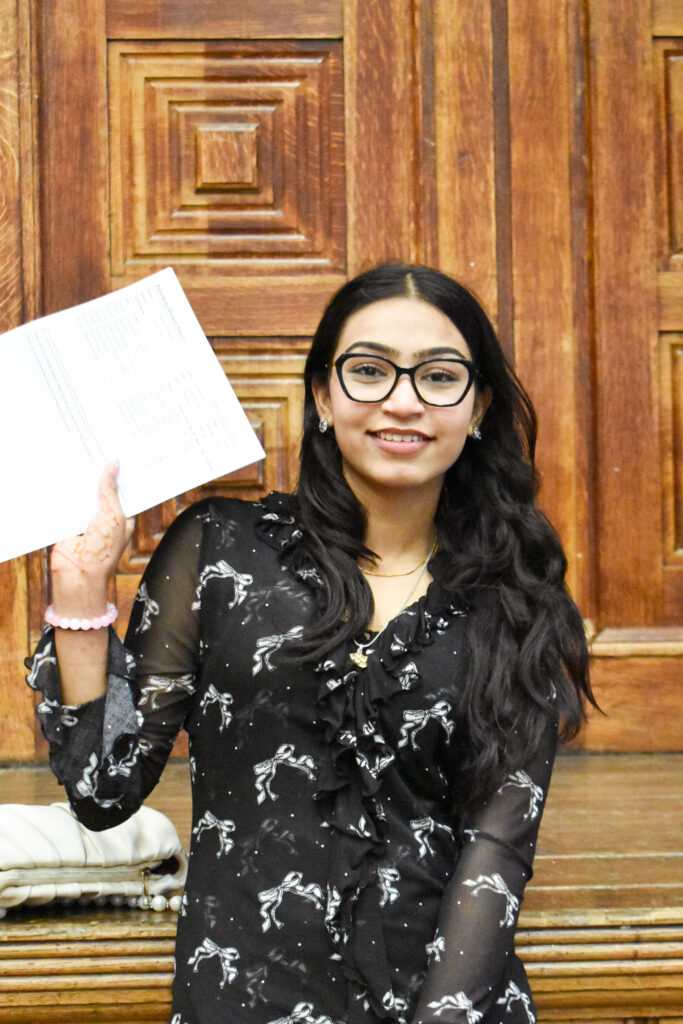 ACS student holding GCSE results