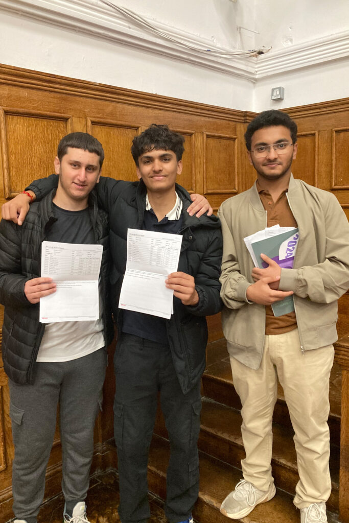 ACS students holding their GCSE results