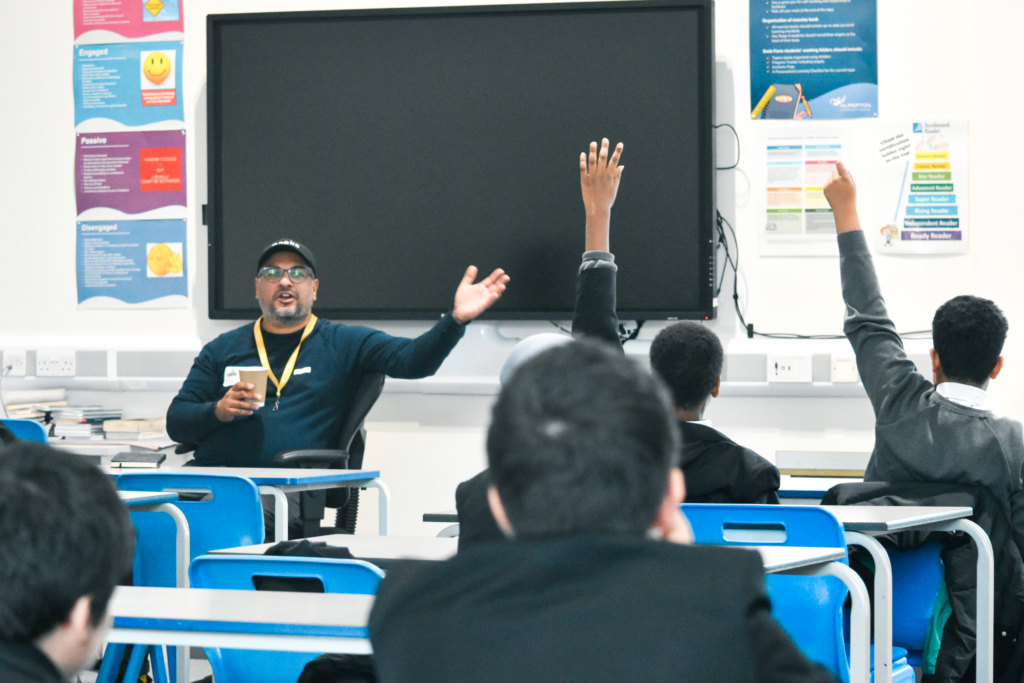 Author Nikesh Shukla delivering talk to Year 9 students