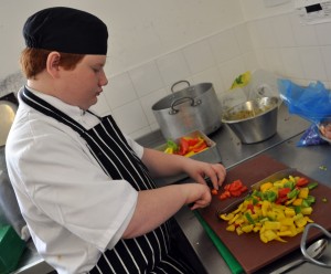 Matthew (Yr9) chops peppers for the salsa.