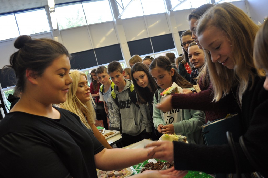 Yr11 student Lauren sells cakes to raise money for Macmillan.
