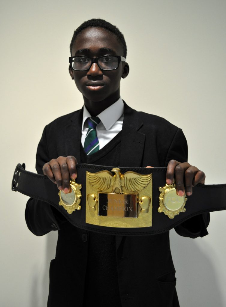 Adam with boxing belt