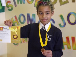 Henryk with his certificate and medal which was awarded to him at today's superstar assembly!