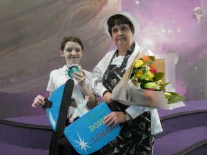 Flowers, a plaque and a card