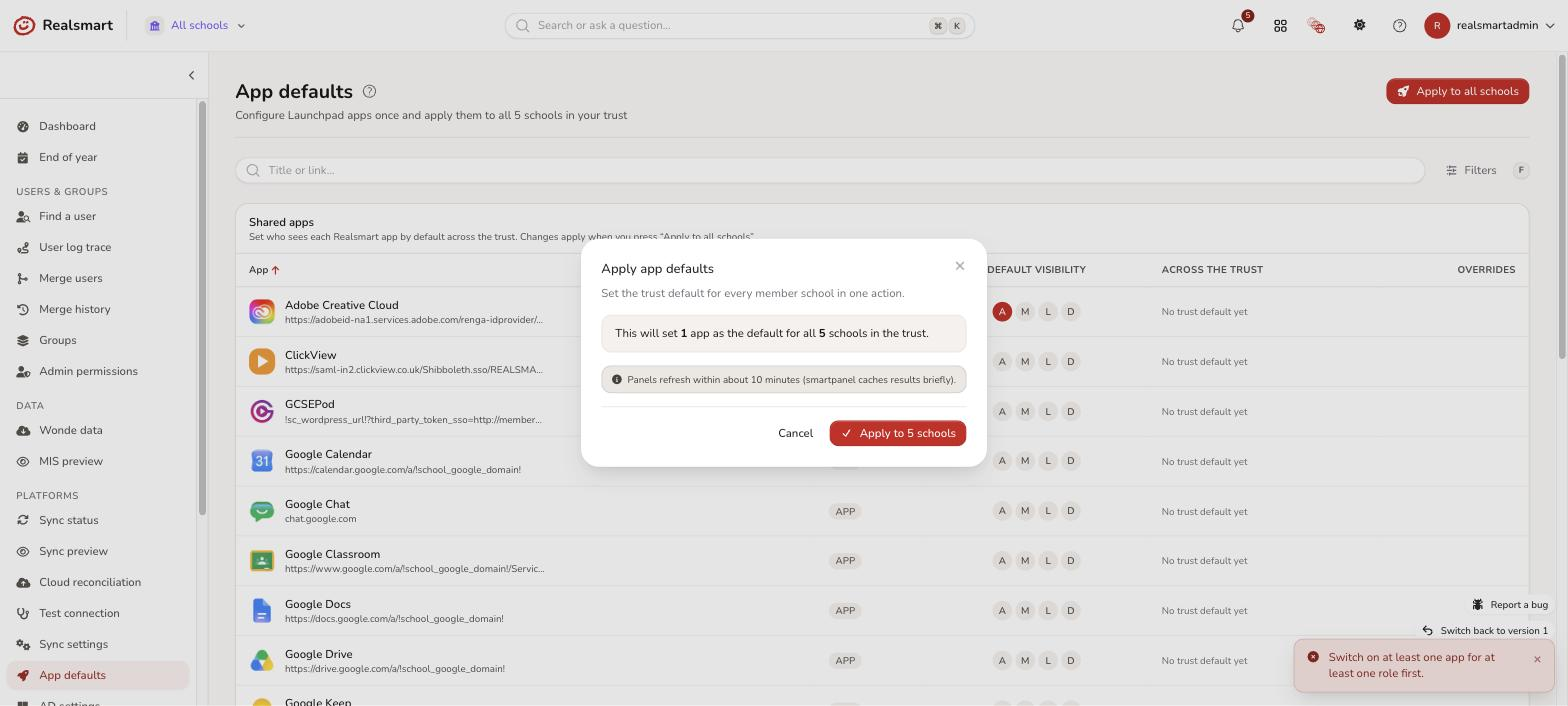 An app row showing its per-school Following, Overridden and Not applied status plus the apply to all schools confirmation dialog