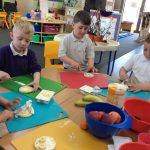 Children buttering rice cakes