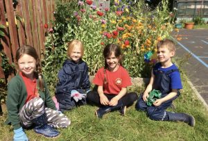 Children sat in garden