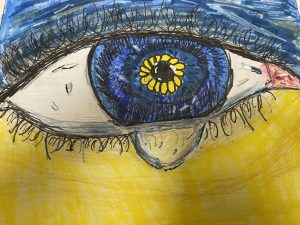 Drawing of an eye with Ukraine flag colours