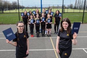 Members of Trinity Catholic College's after-school netball club have fired themselves to a Guinness World Record after racking up more than 1,000 goals in just an hour – Photo by Dawn McNamara