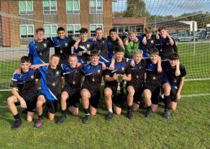 Sacred Heart Catholic Secondary School's triumphant football team