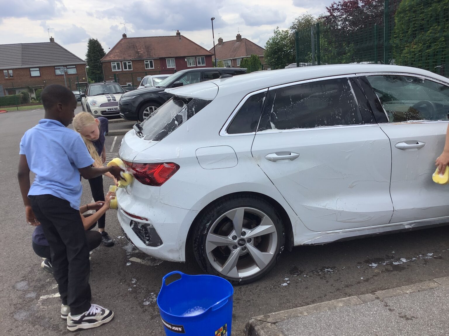 Washing staff cars to raise money! | Plover School