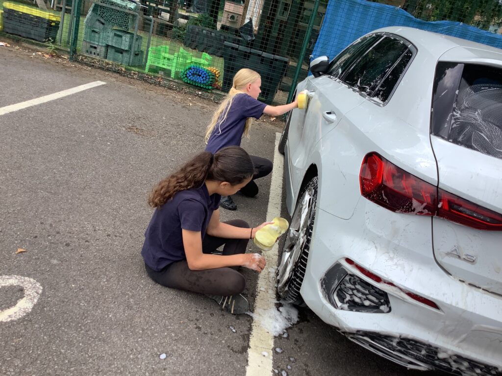 Washing staff cars to raise money! | Plover School