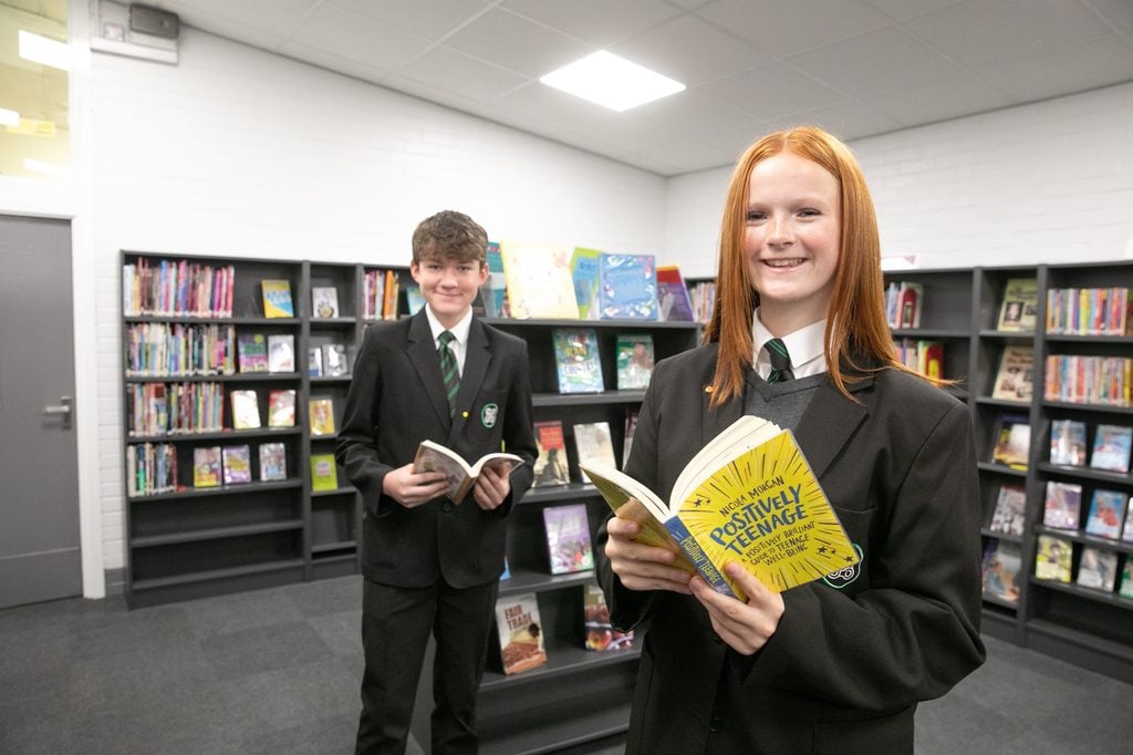 Two students enjoy the recently refurbished library at Priestnall School.