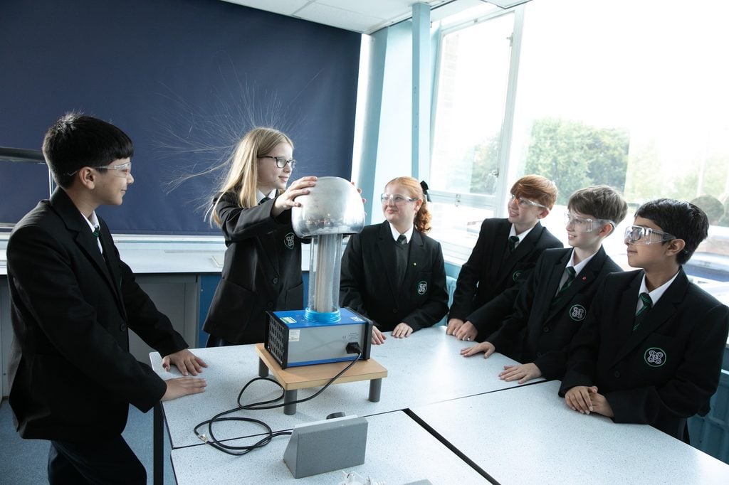 Students in Priestnall School take part in a Science experiment using static electricity.
