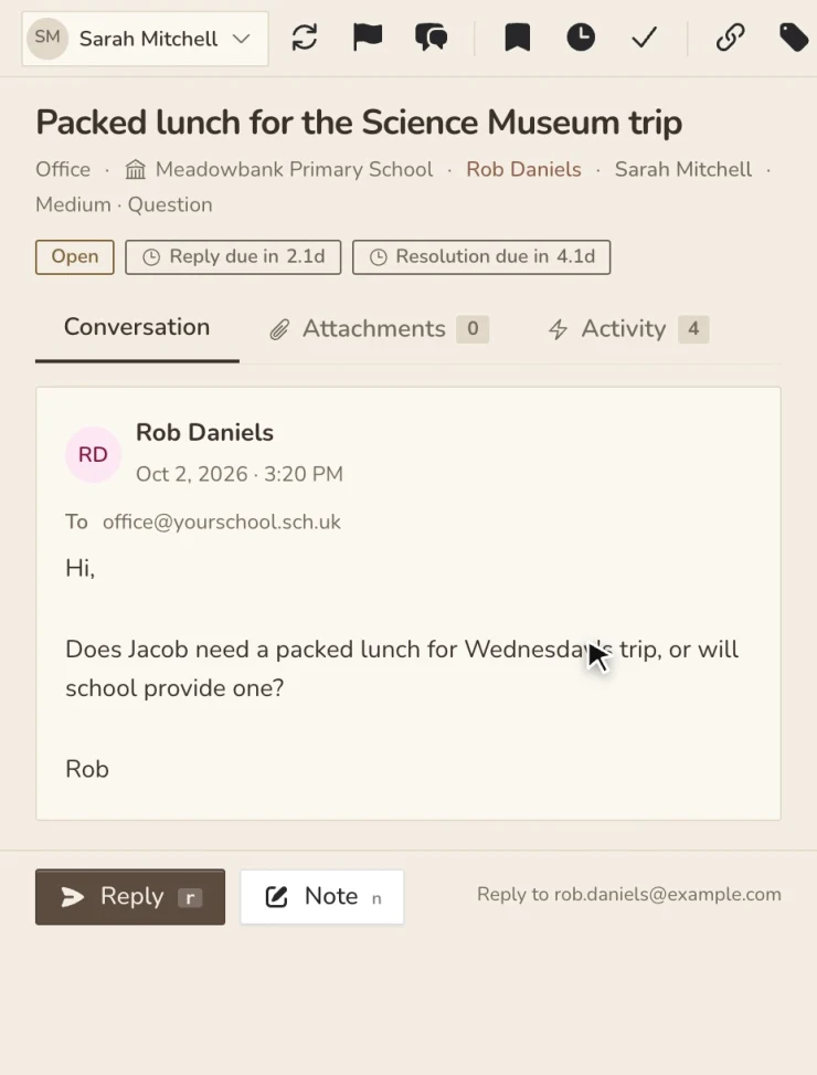 Recorded in Beacon: Claire reassigns a parent's email from Sarah to Tom and leaves him an internal note