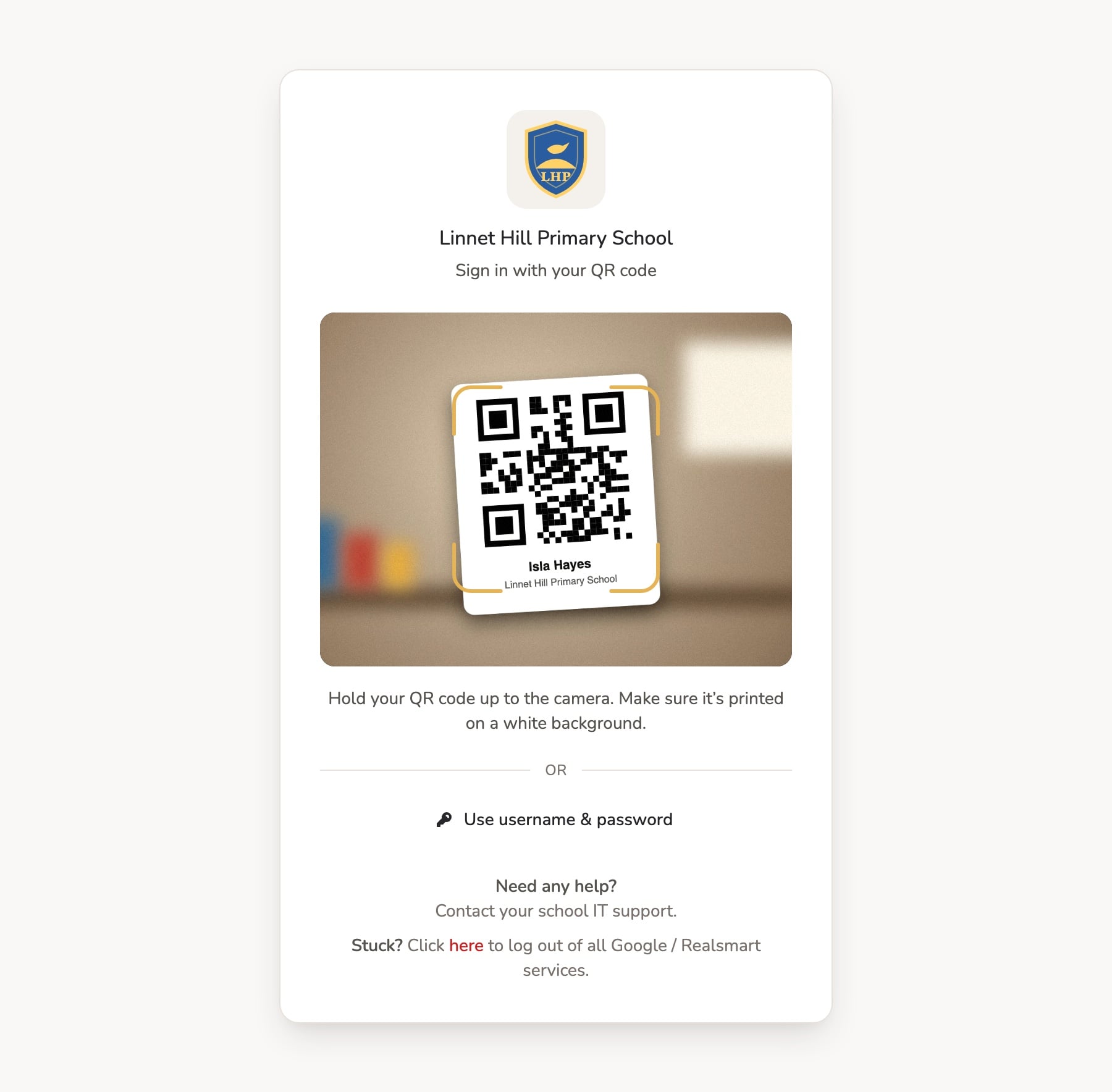 The QR code sign-in page for the demo school Linnet Hill Primary School, with a camera feed showing a pupil's printed QR sign-in card inside a gold scanning frame.