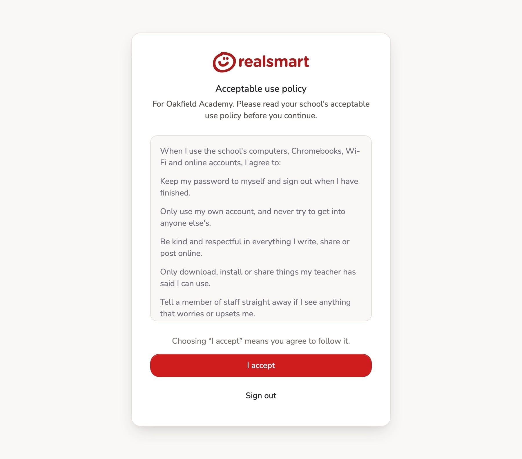The Realsmart sign-in step showing the demo school Oakfield Academy's acceptable use policy in a scrolling box, with an 'I accept' button and a 'Sign out' link below.