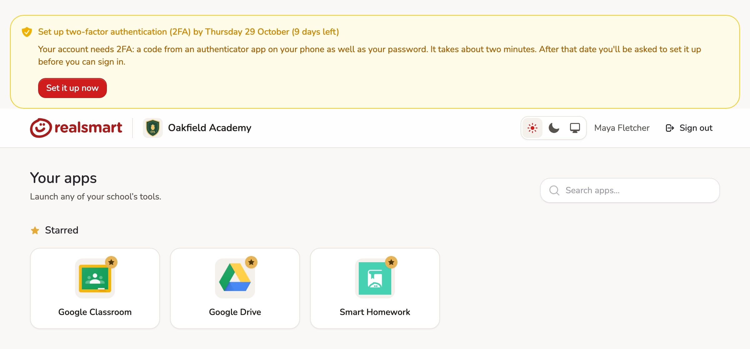 A yellow banner on the Realsmart launchpad for an admin at the demo school Oakfield Academy, reading 'Set up two-factor authentication (2FA) by Thursday 29 October (9 days left)' with a 'Set it up now' button.