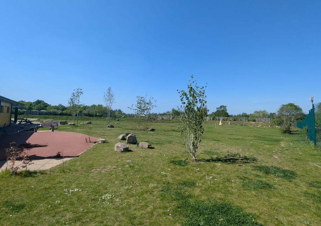 Enclosed field space at Woodgate Primary Academy, Pease Pottage