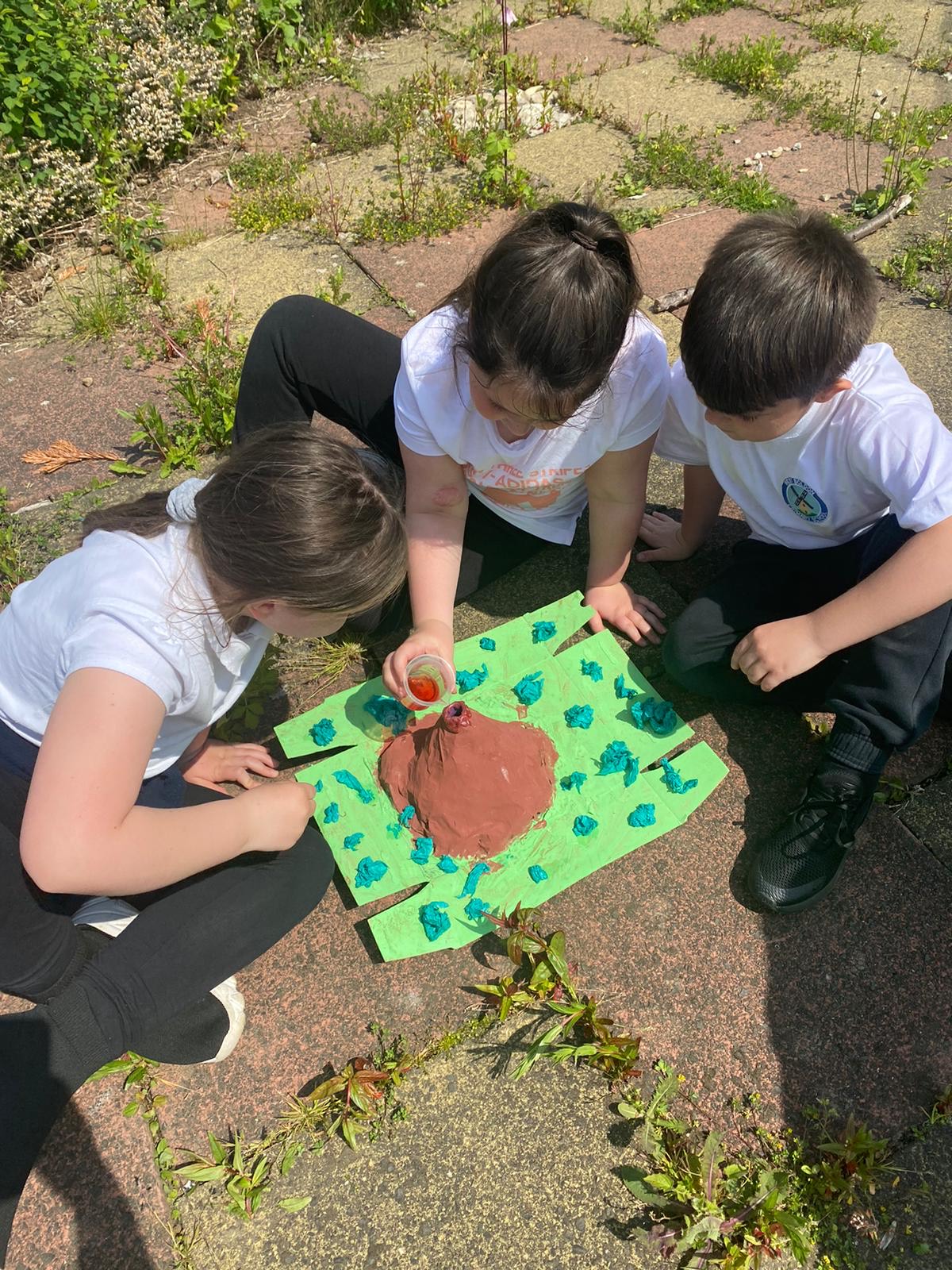 Children erupting their volcanoes