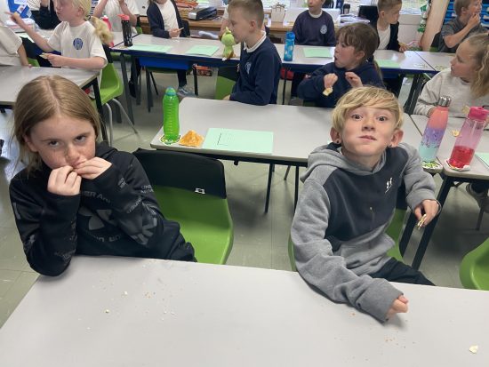 Children taking part in the cream cracker challenge
