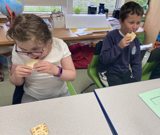 Children taking part in the cream cracker challenge
