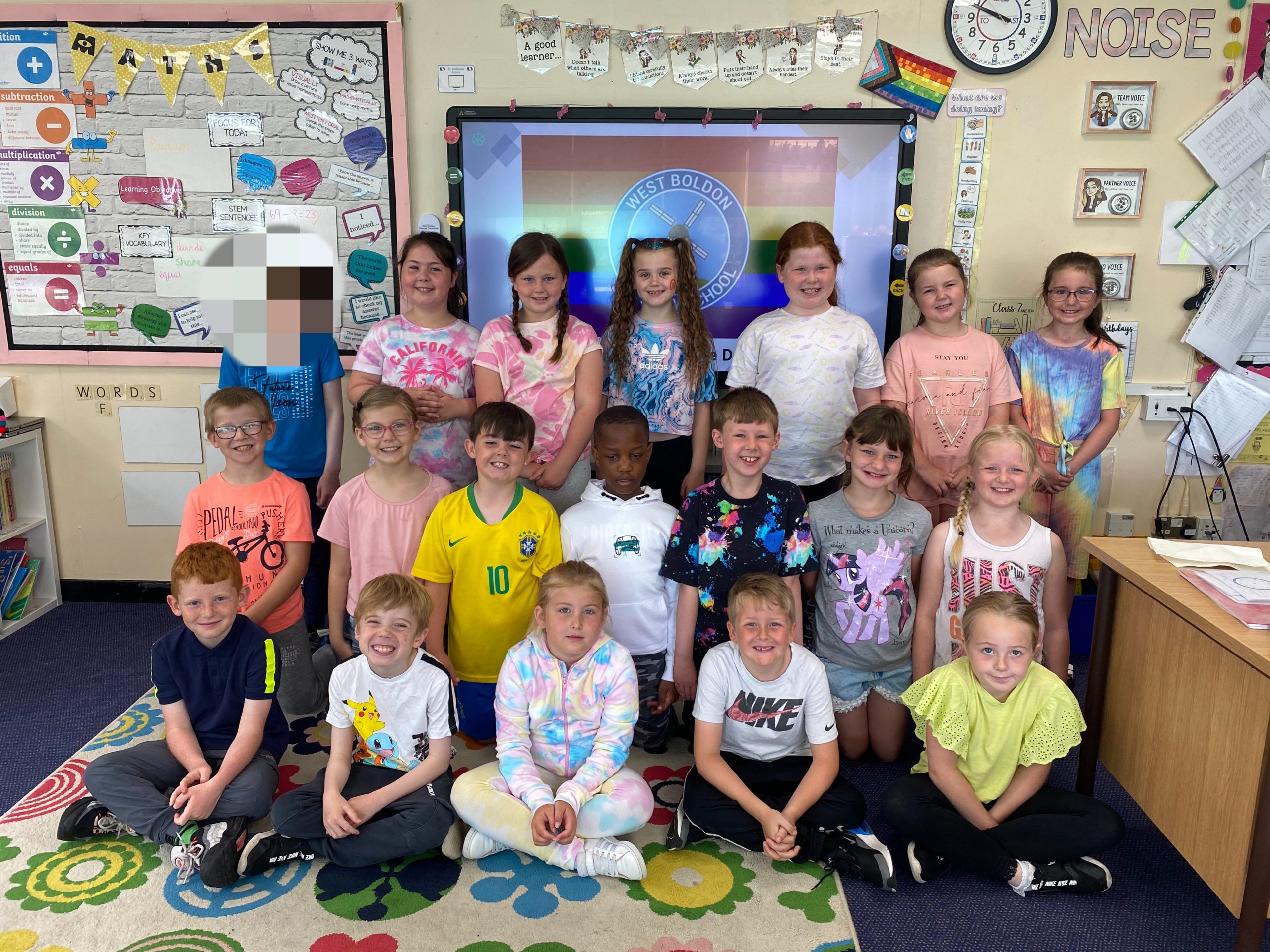 Children in year 3 dressed in bright colours for Diversity Week