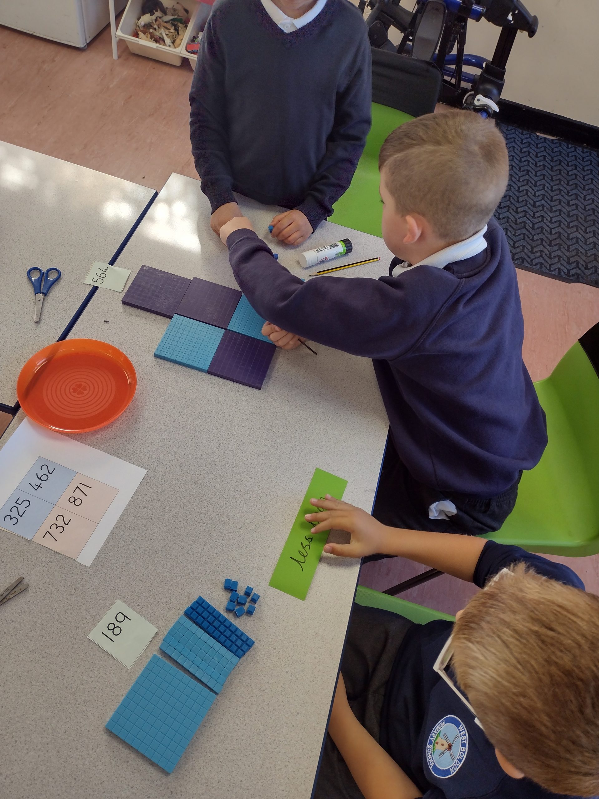 Year 3 children enjoying their practical maths lesson