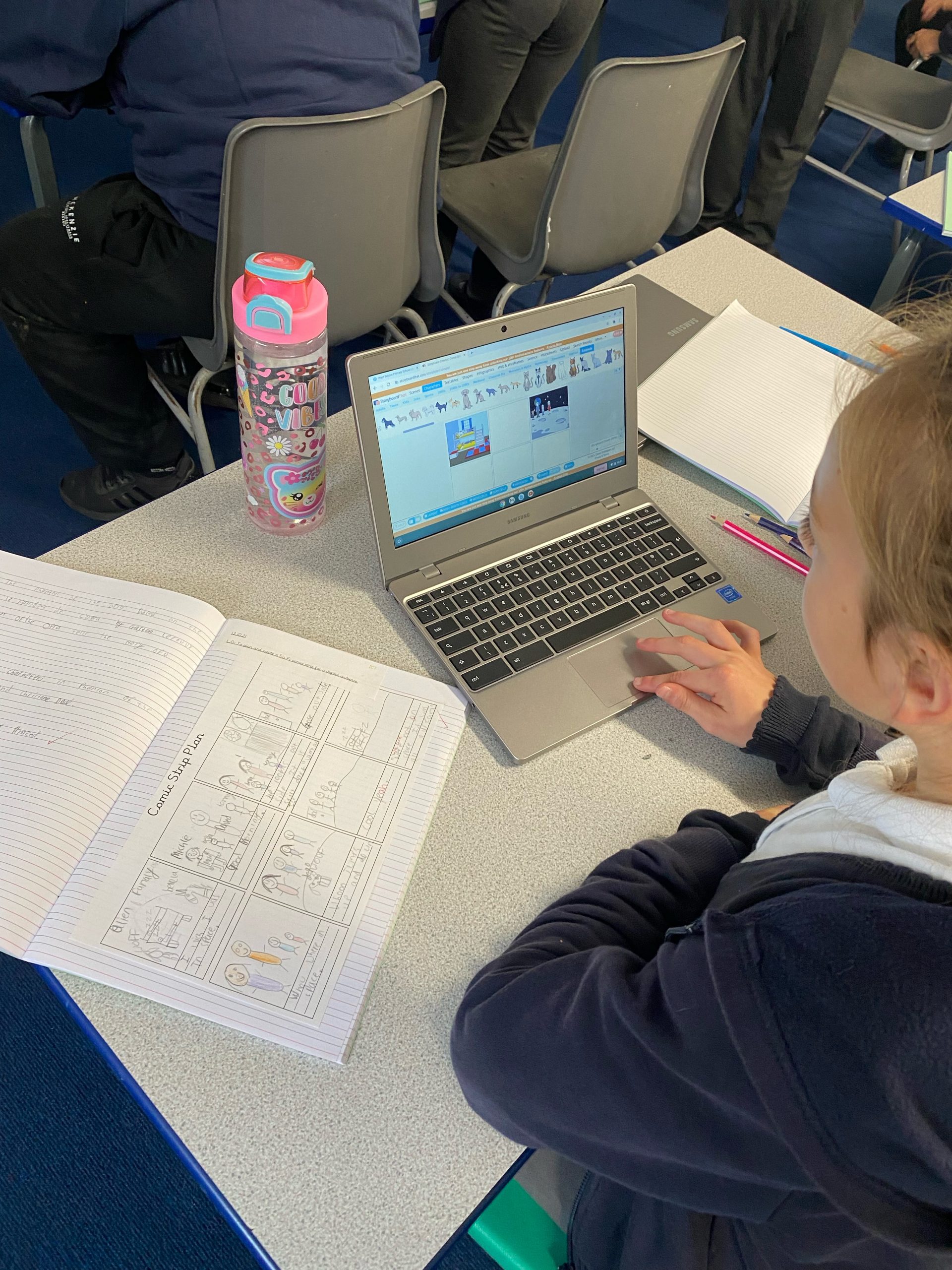 Year 5 using the chromebooks to create their own comic strips