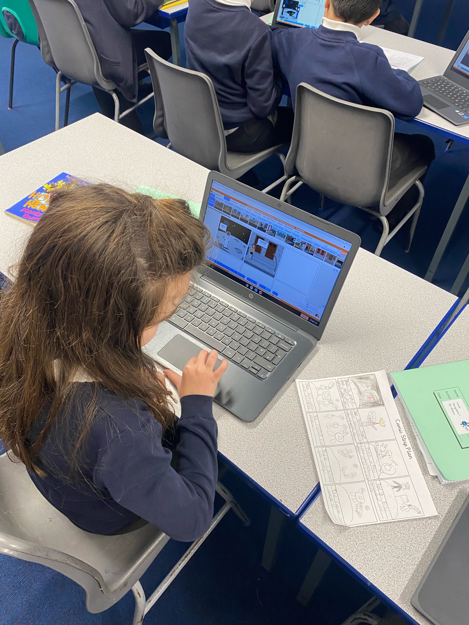 Year 5 using the chromebooks to create their own comic strips