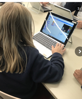 Year 4 working on the laptops at the Word