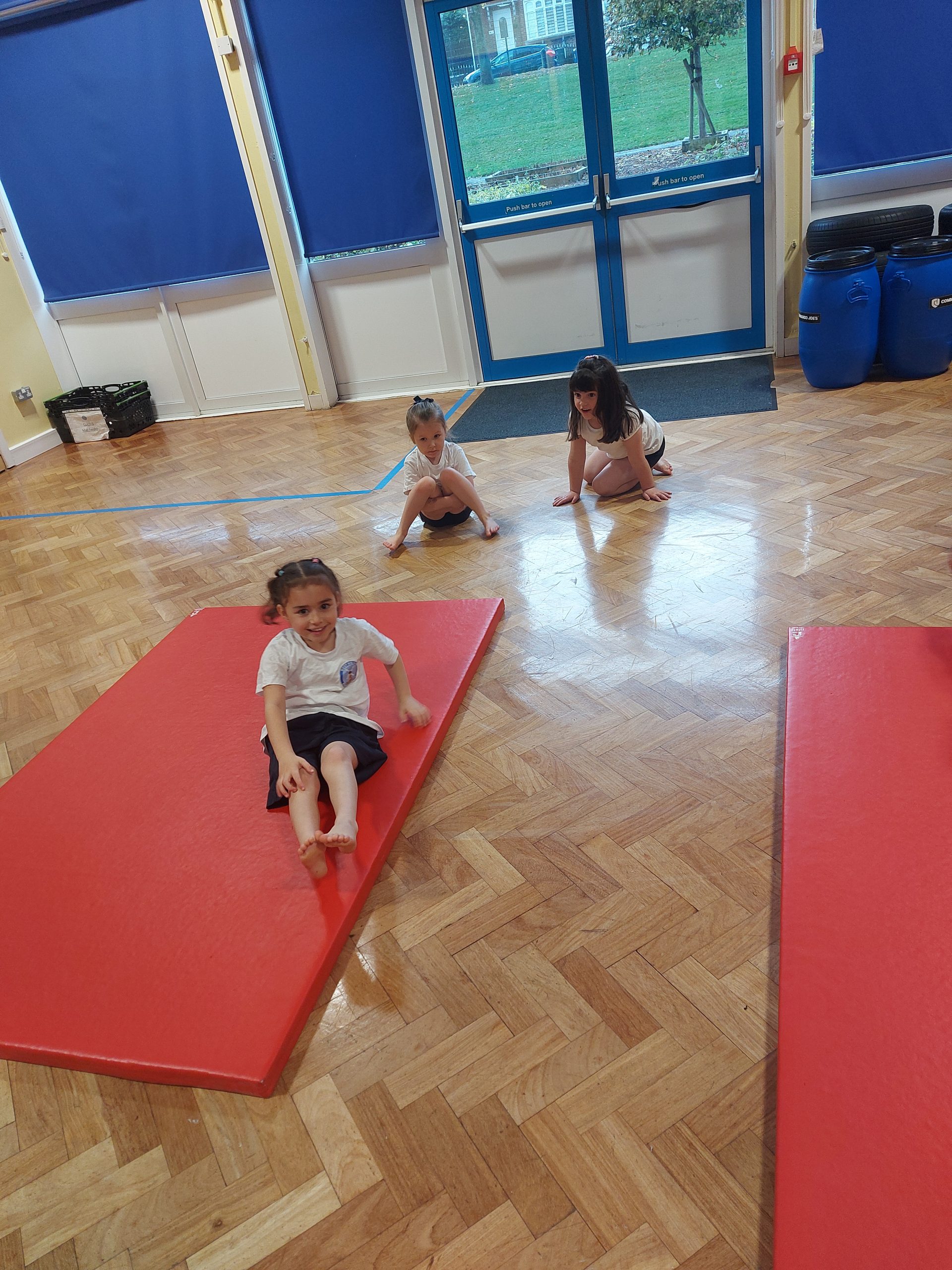 Class 3 taking part in gymnastics with Mr Gilmore