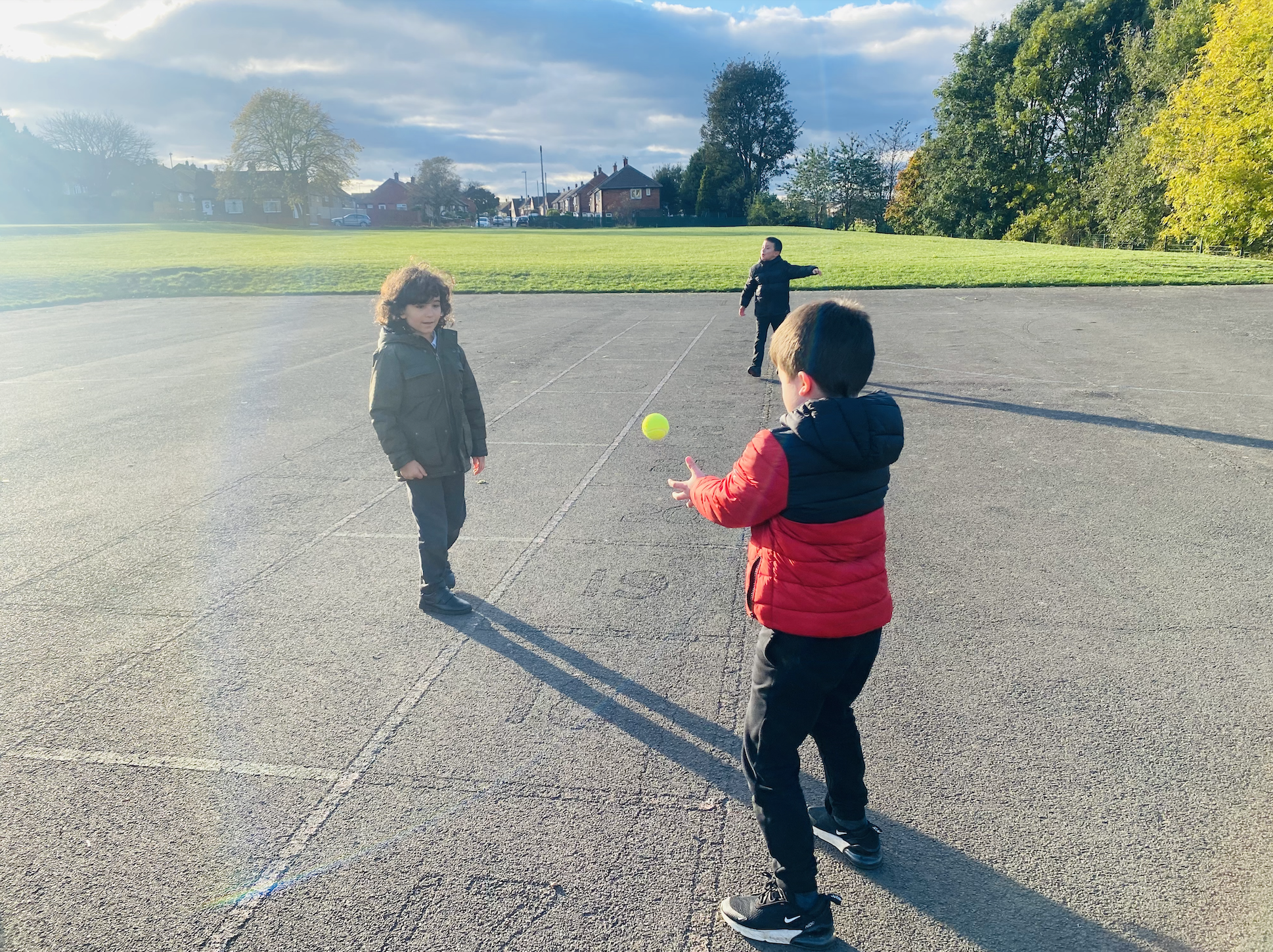 Year 3 children investigating gravity by throwing and catching