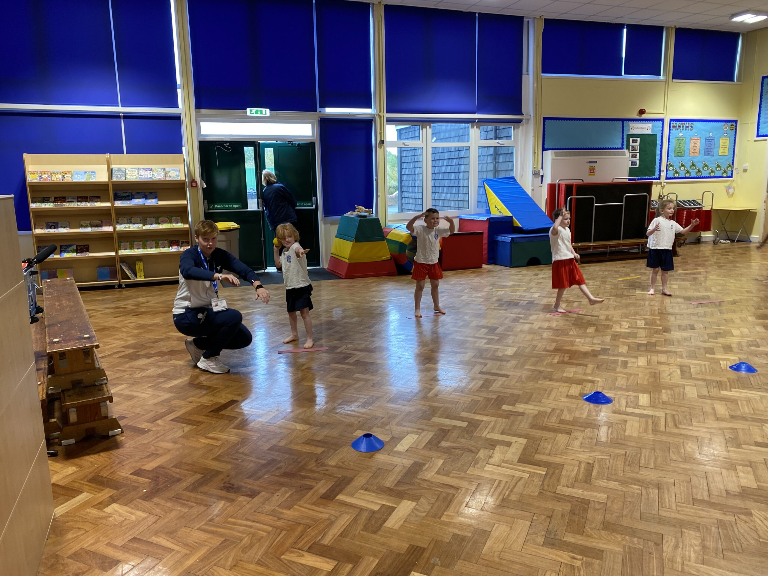 Year 1 taking part in their tennis coaching lesson