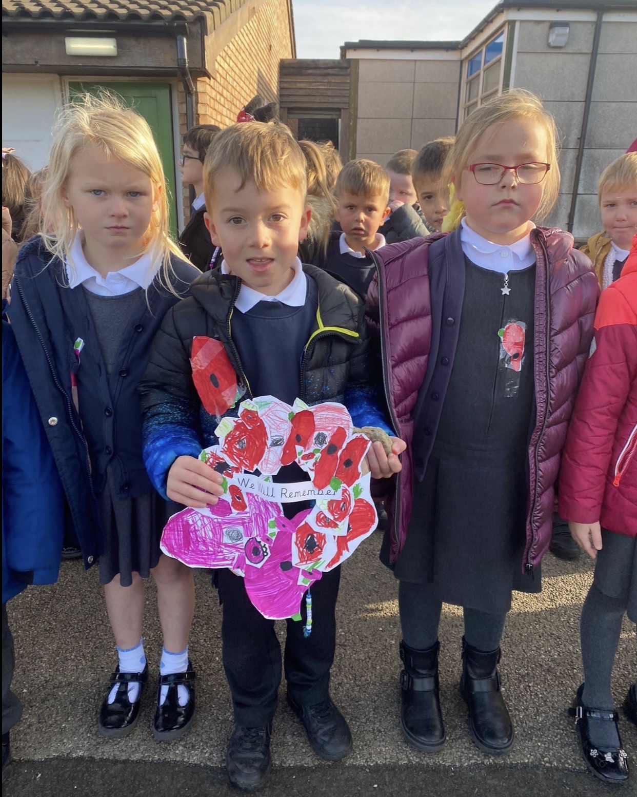 Year 1 children with their wreath