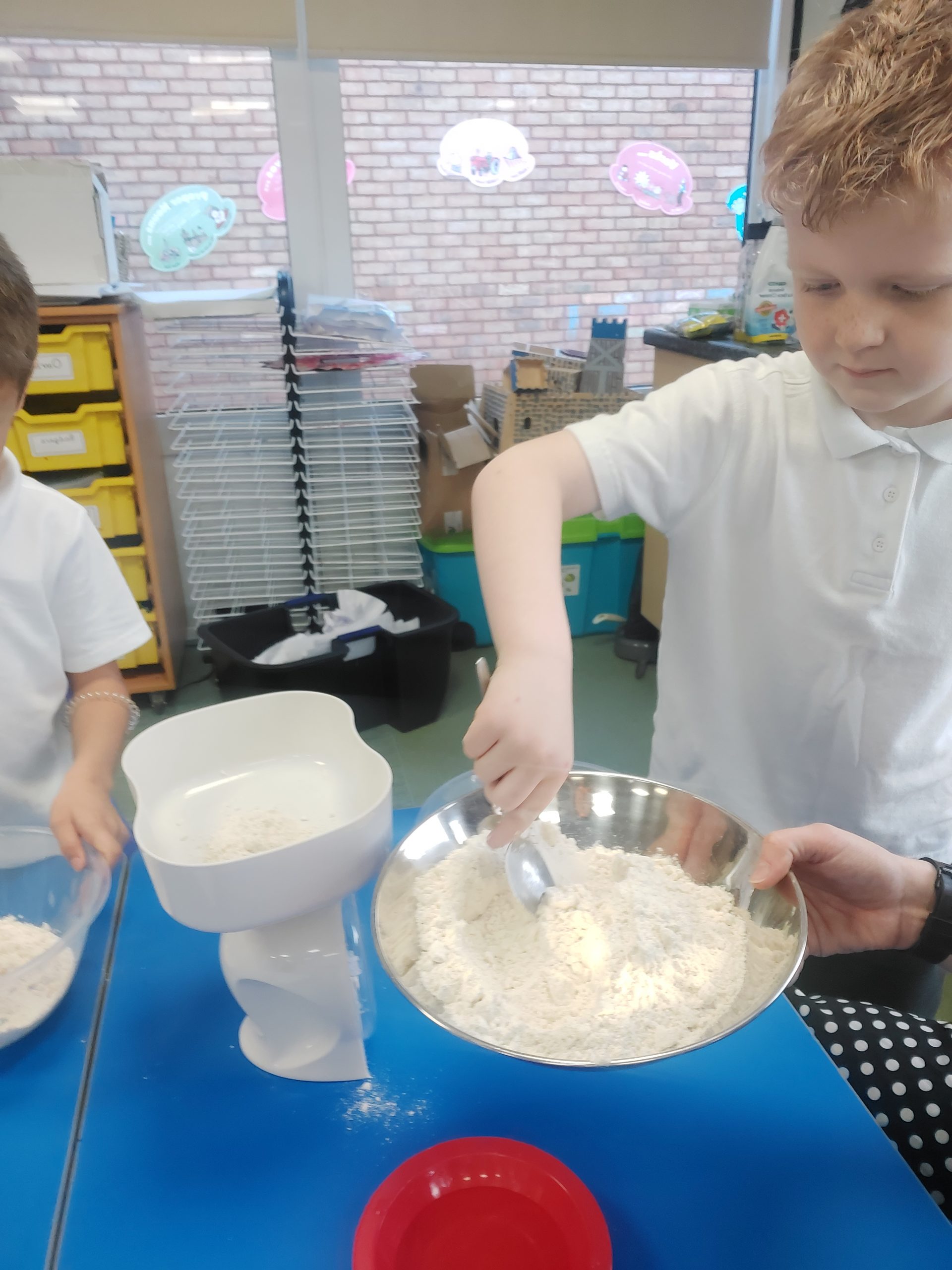 Year 1 children making their own bread