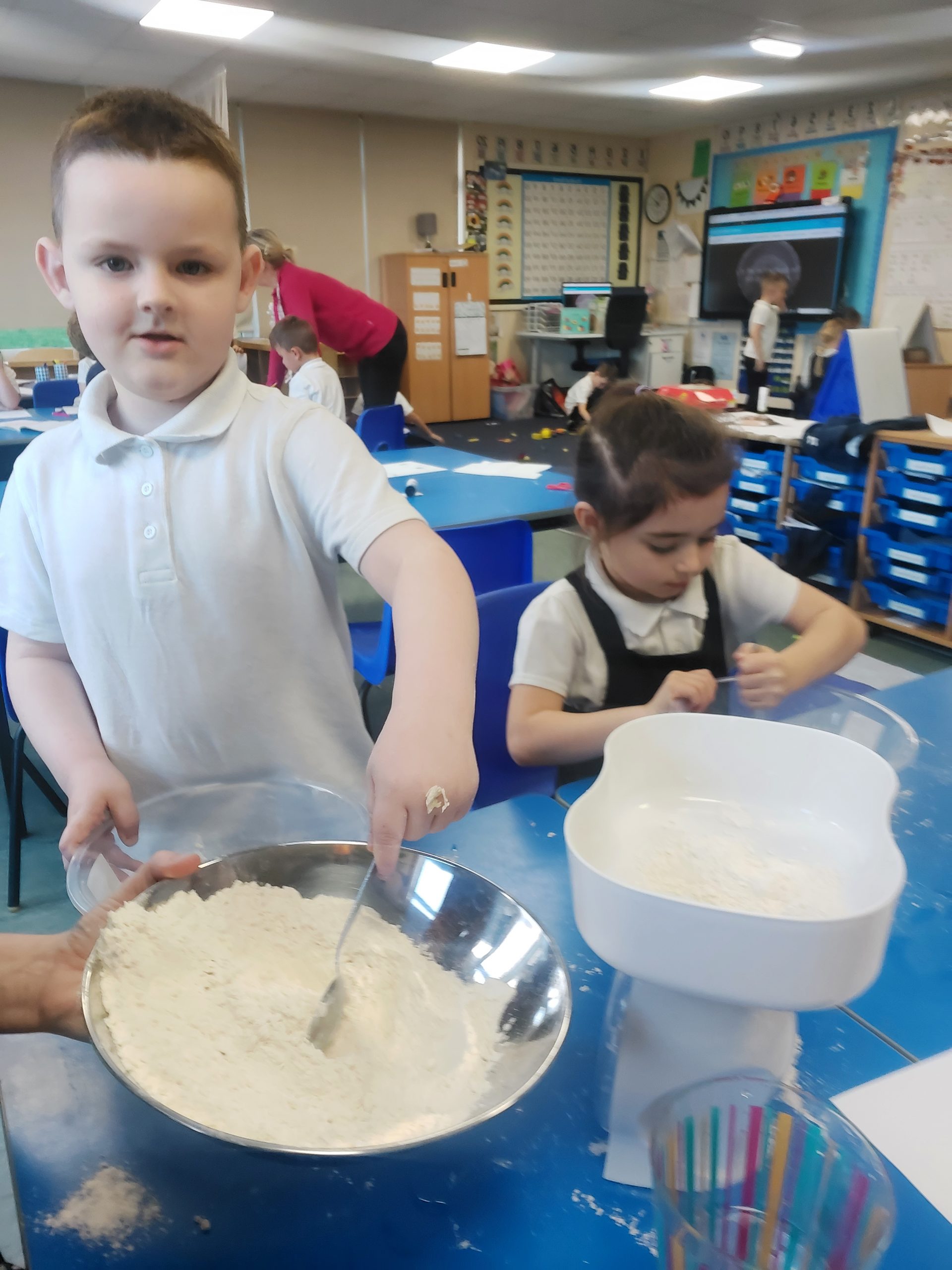 Year 1 children making their own bread