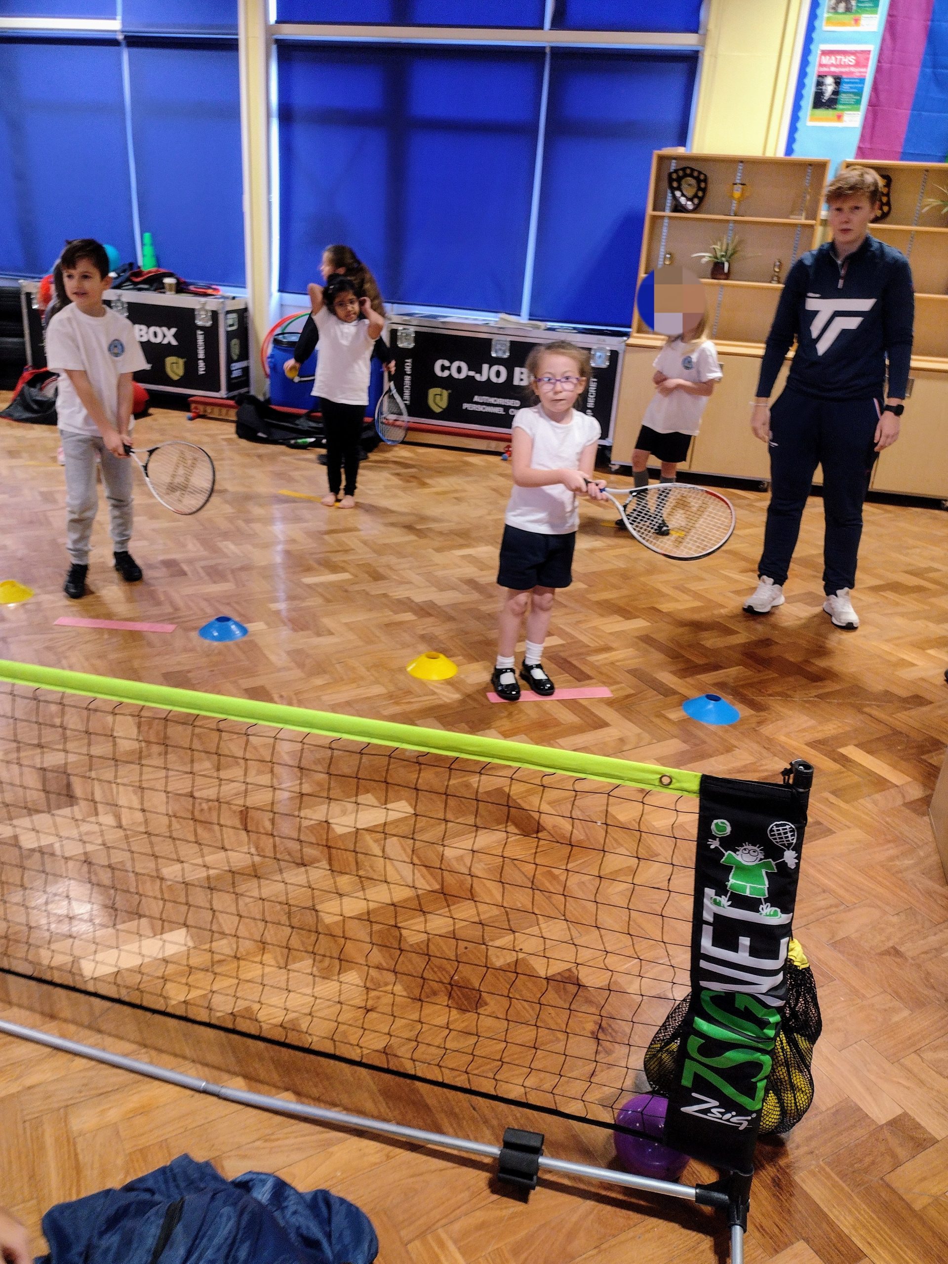 Year 3 playing tennis