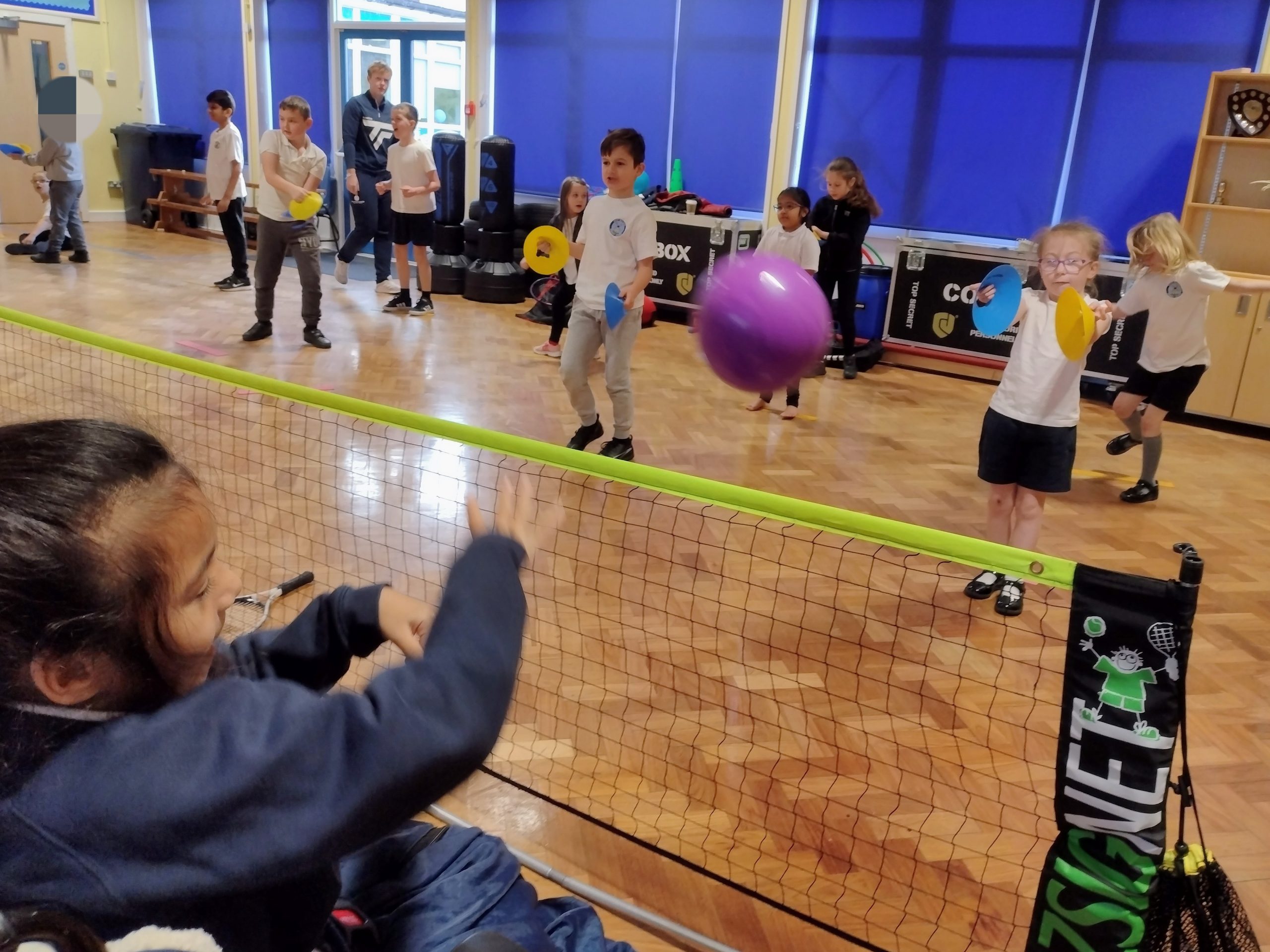 Year 3 playing tennis