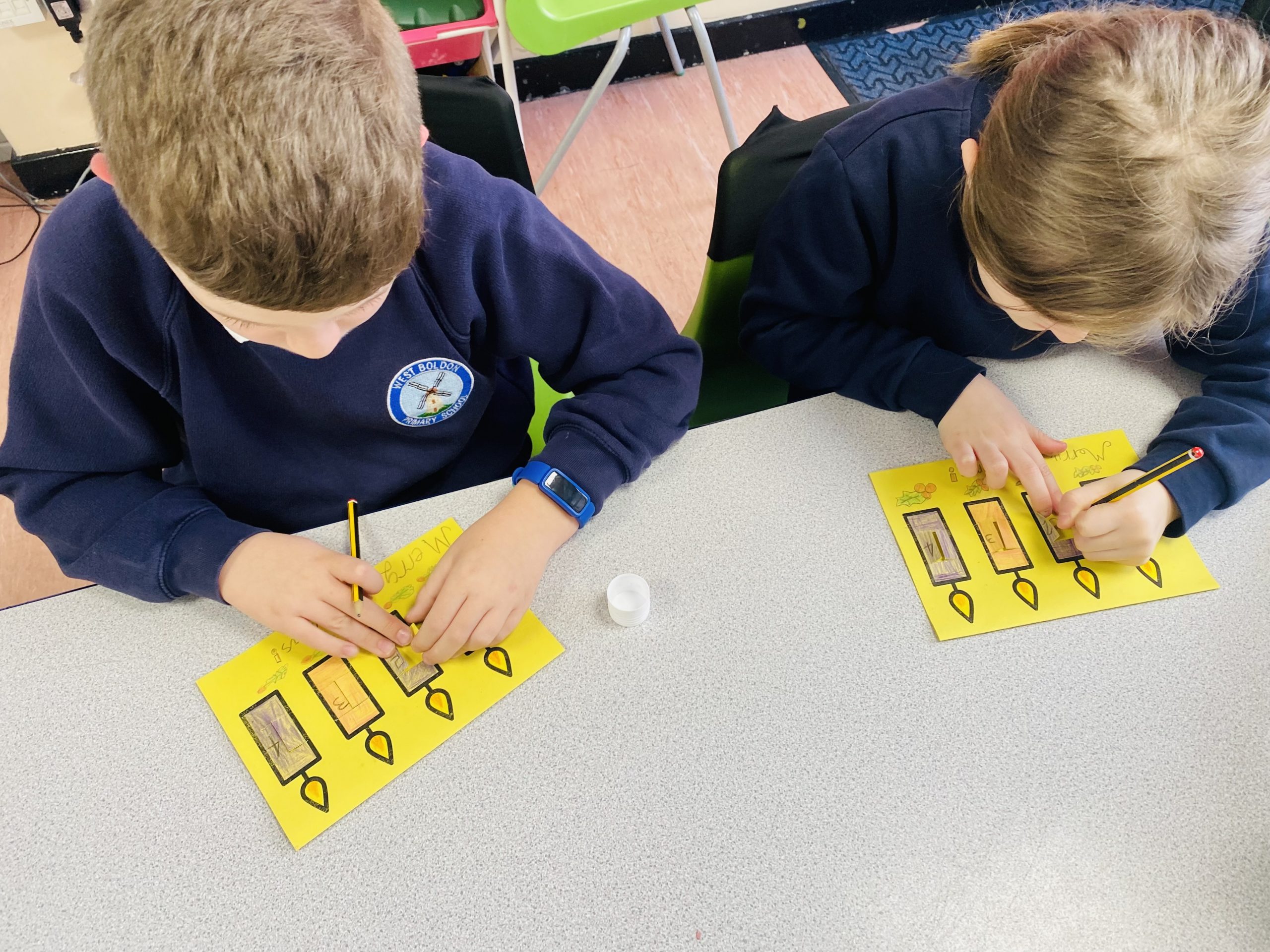 Year 3 children creating their beautiful Advent calendars