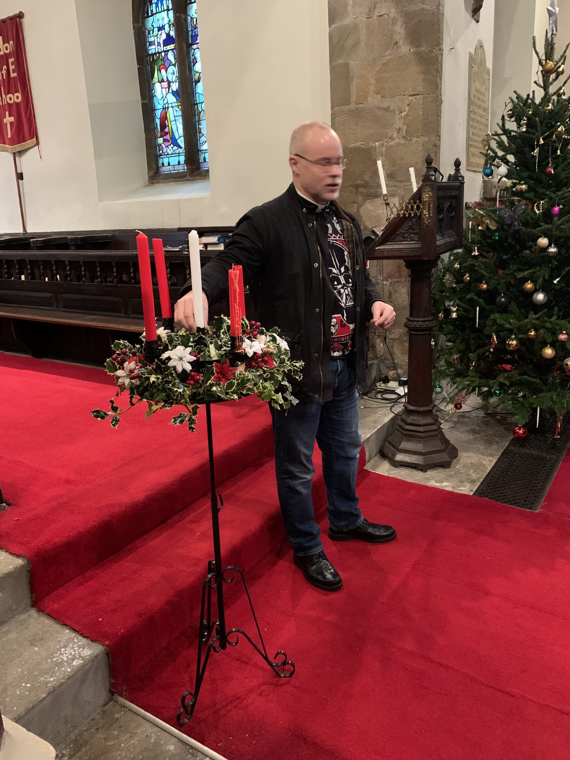 Rev Paul speaking to the children