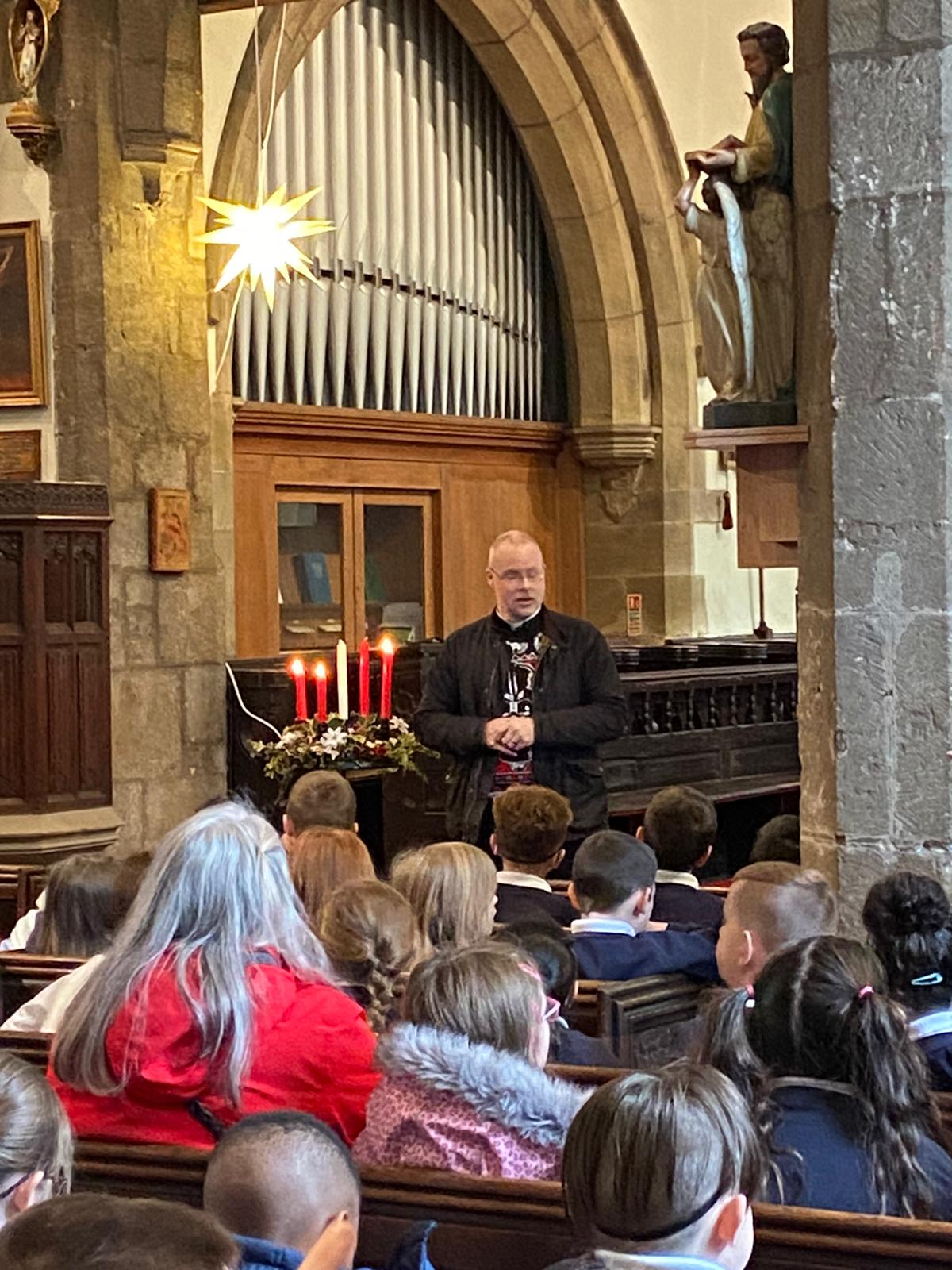 KS2 children asking Rev. Paul questions