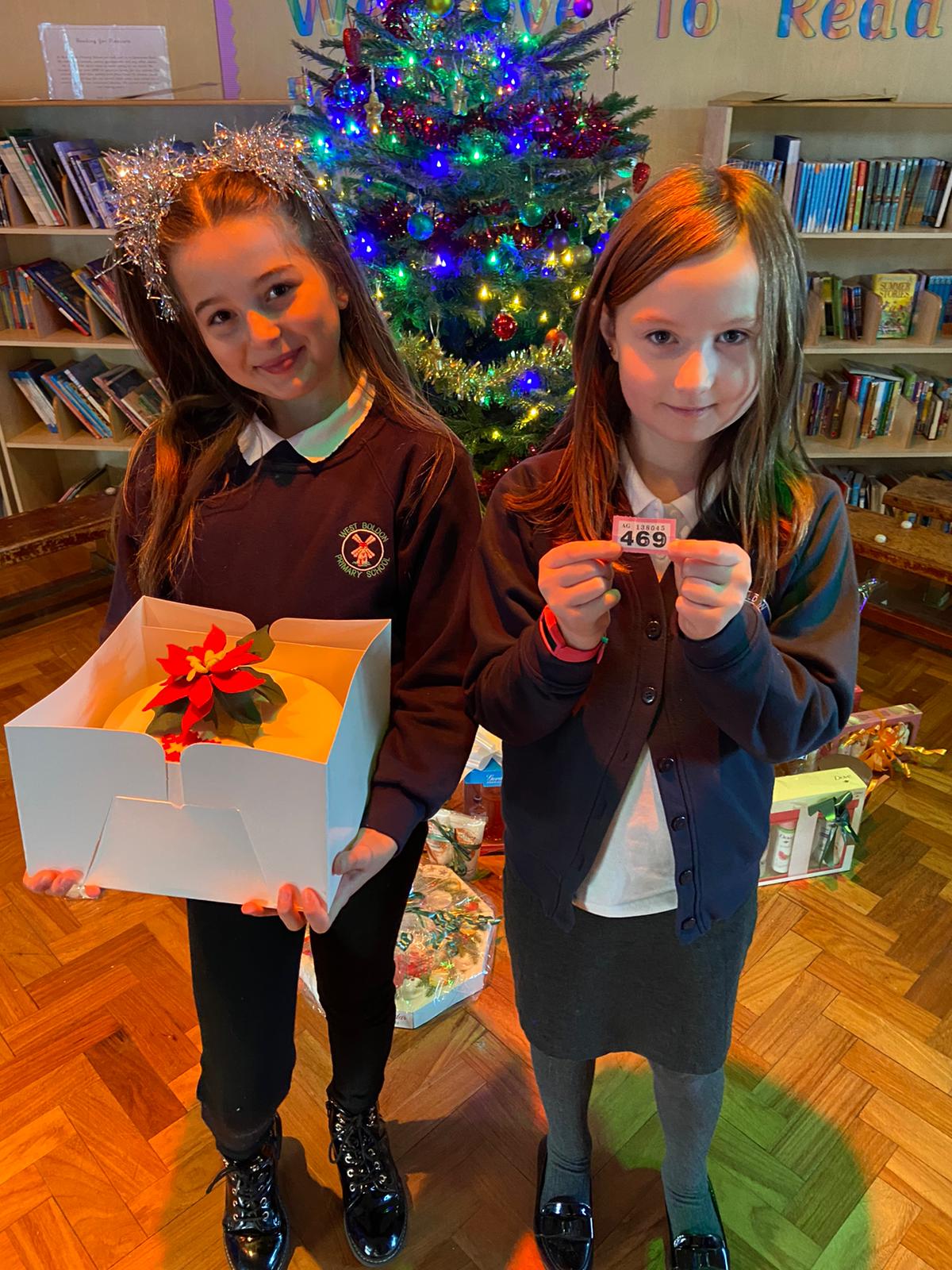 Year 6 children drawing the raffle