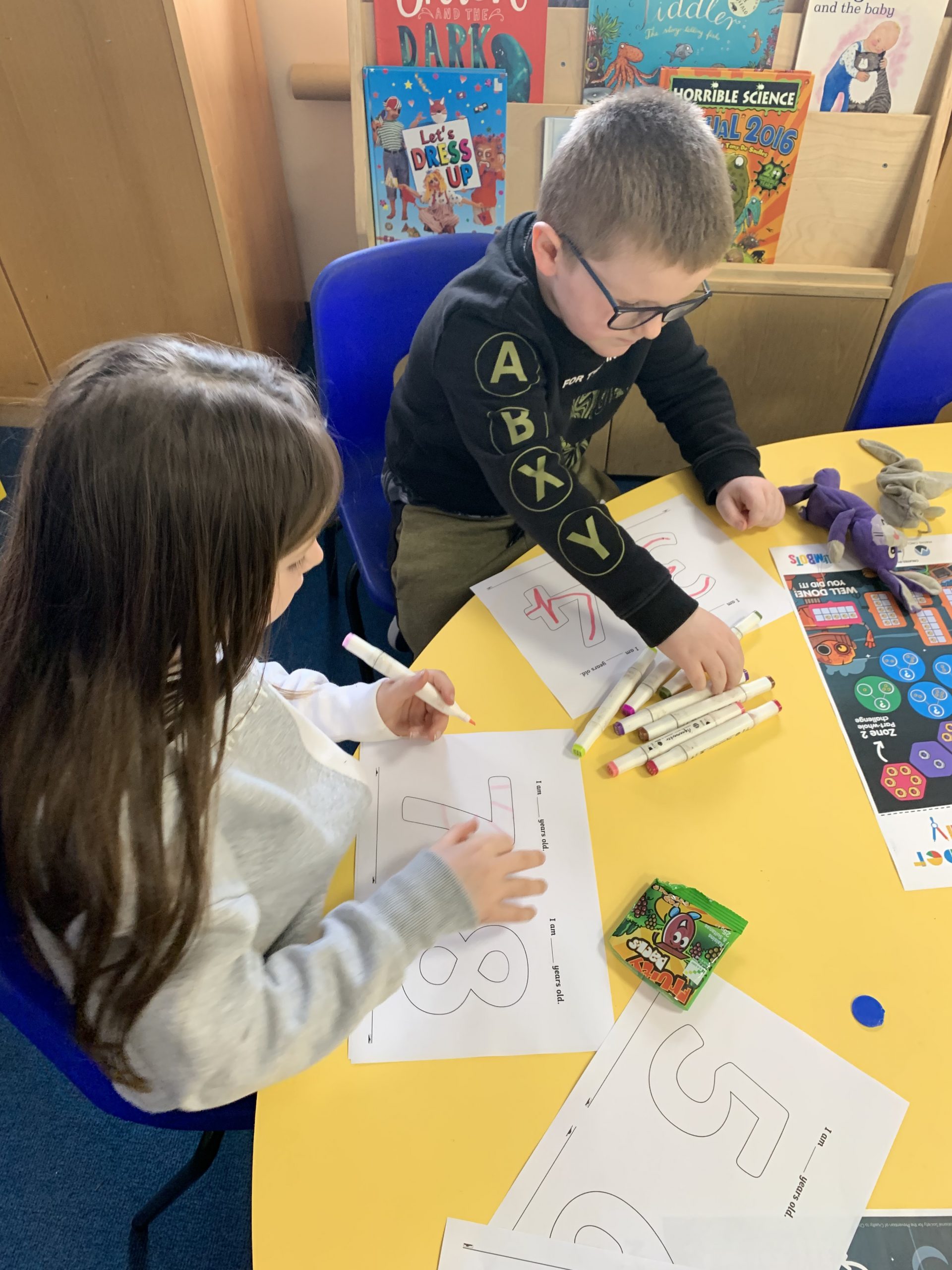 Year 2 children solving maths problems for number day