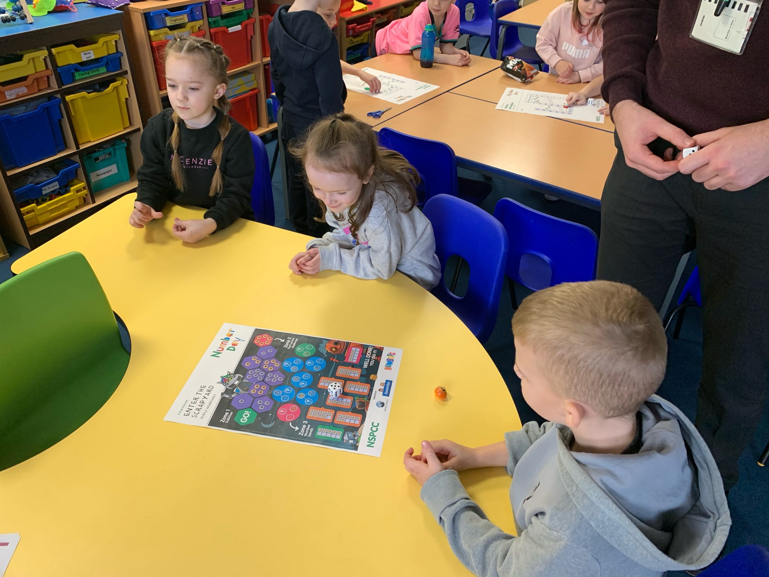 Year 2 children solving maths problems for number day